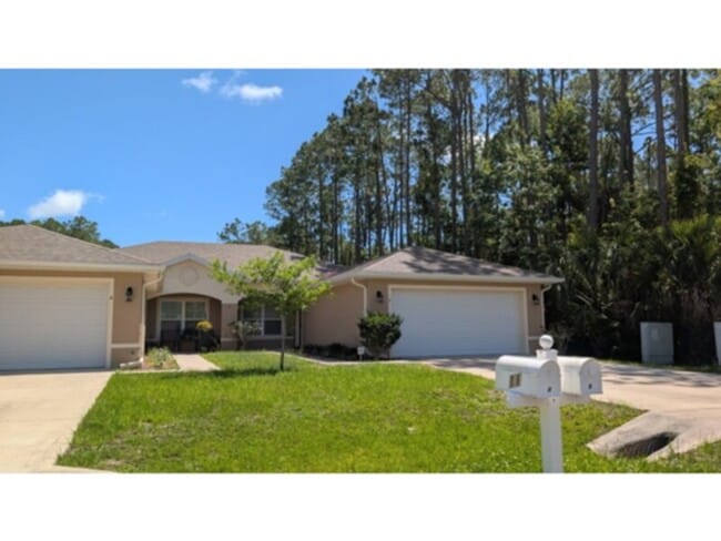 Building Photo - Updated Spacious Rental Available in Palm Coast, FL