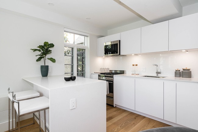 concepto abierto de cocina de lujo - 2900 Adams Mill