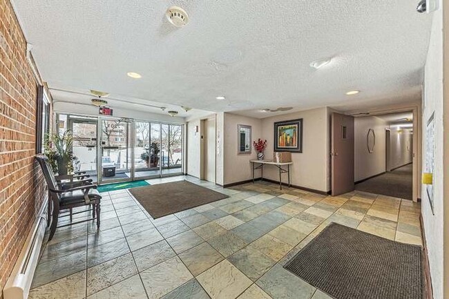 Front Entrance - 2201 S Stewart Ave Unit 4M