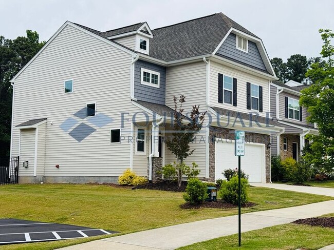 Photo - End-Unit Townhome with Fenced Yard, Washer/Dryer included & 2-Car Garage – Comfortable & Convenie...