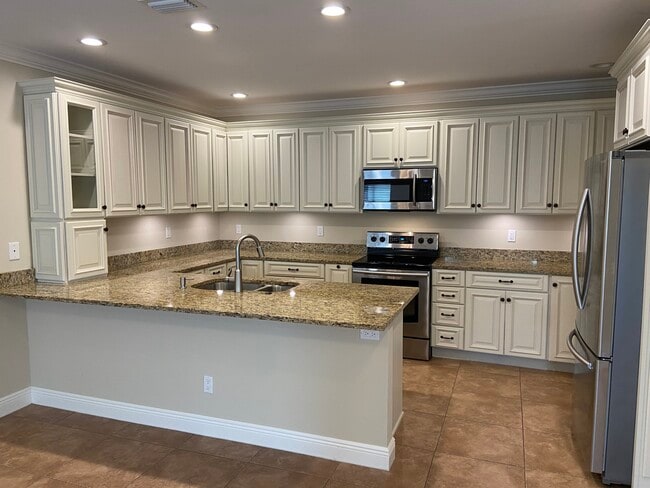 Building Photo - 4412 Vanda Dr Unit Duplex Rental