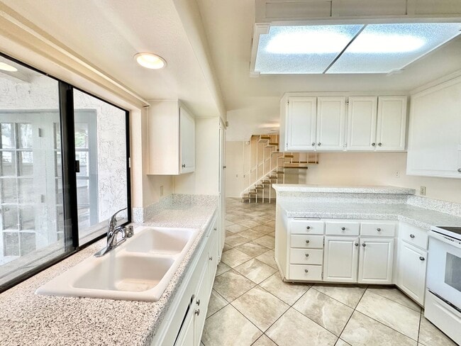 Photo - Spacious Condo with A Large Patio and Upstiars Balcony! Parking and Water Included!