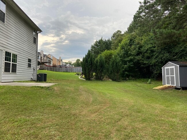 Photo - 4BR Home w/ Fireplace + 2-Car Garage in Snellville