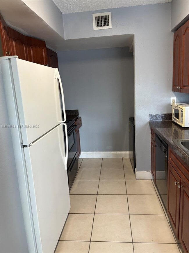 Building Photo - 15231 SW 80th St Unit 602