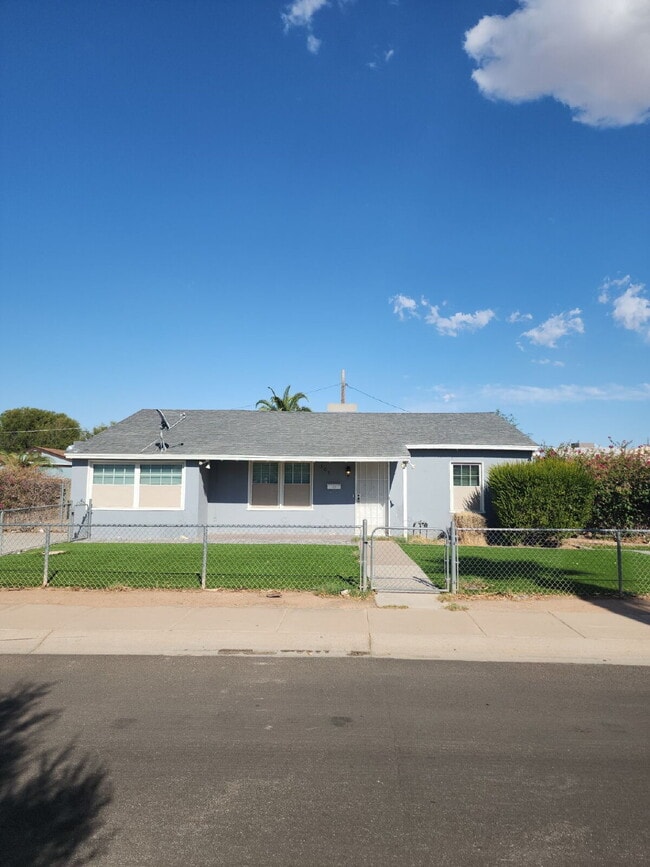 Building Photo - "Affordable and Charming 4-Bed Oasis with ... Rental