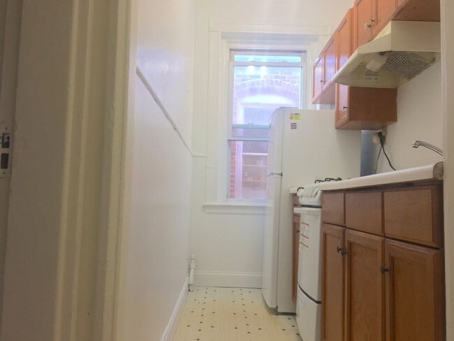Photo - No brokers Fee, No Security Deposit, Heat Hot Water Included, Steps from the T Stop, Parking for ...