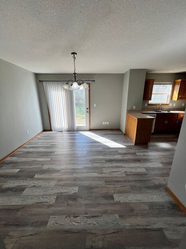 Photo - 3 Bed, 1.5 Bath Duplex with Garage and Extra Storage Space!