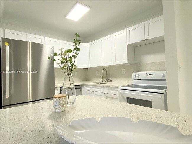 Building Photo - 4780 NW 102nd Ave Unit 104