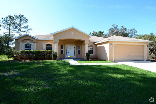 Building Photo - "Spacious 4-Bed Oasis in Palm Coast with 2... Rental