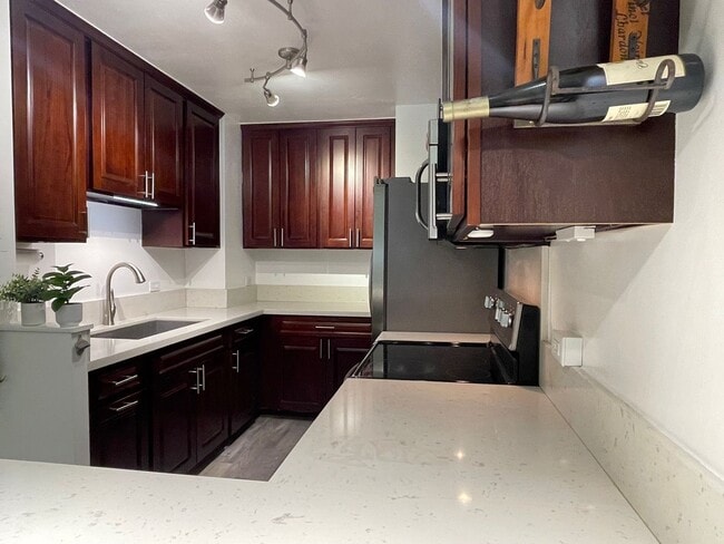 Photo - Partly Furnished 2-bedroom, 2-bath condo a... Unit 206