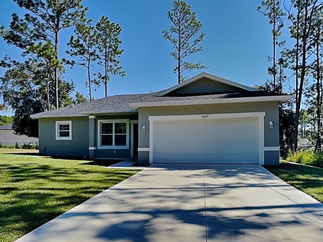 Building Photo - 7669 N Paris Dr