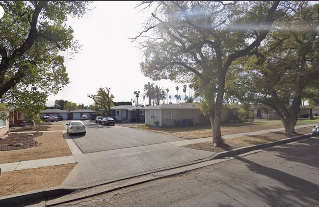 Building Photo - 18th Street East Triplex Unit 277