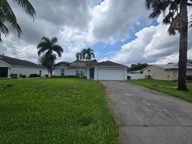 Building Photo - Port St. Lucie Single-Family home with Fen...