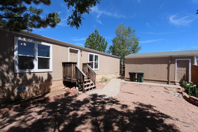 Photo - Bright 3-Bedroom Home with Fenced Yard + Detached 2-Car Garage