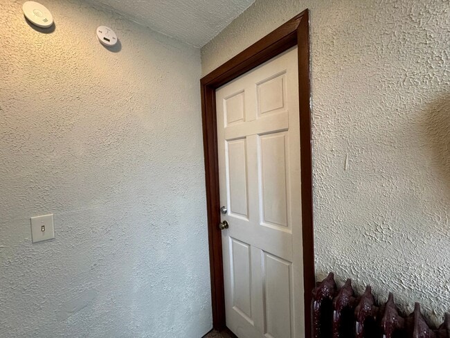 Photo - Racine Cozy 1BR / 1BA Apartment | Off-Street Parking + Appliances +  Walk-In Shower Unit 2 - UPPER #2