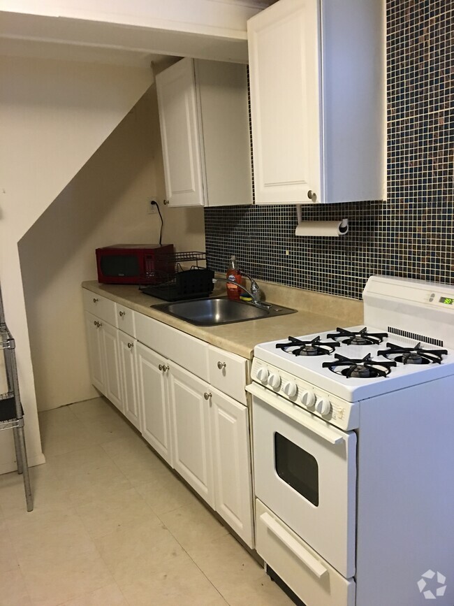 Building Photo - 8718 31st Ave Unit 1 BR Apt w/ Utilities