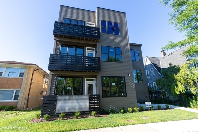 Building Photo - 8917 Grant Ave Unit 3B