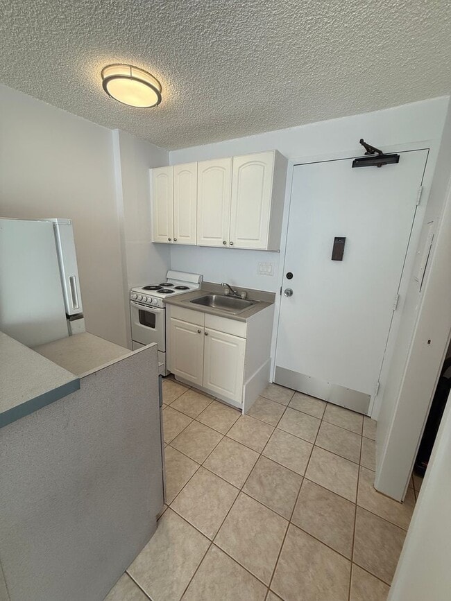 Photo - Kapiolani Terrace #706- Super convenient location!!! with ASSIGNED PARKING STALL!! Unit 706