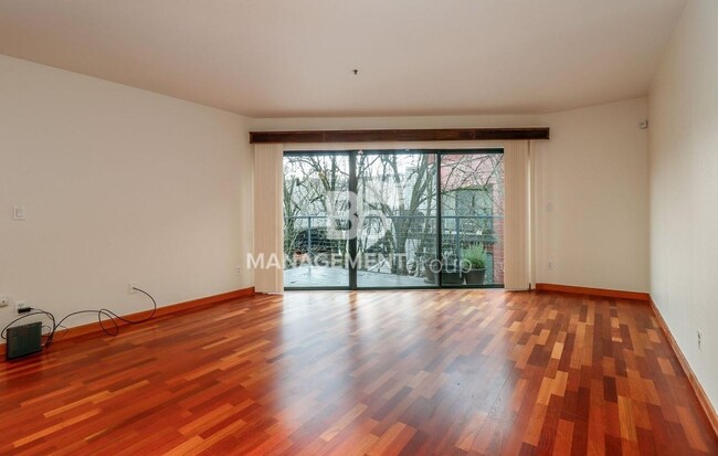 Photo - Spacious Riverfront Condo- Beautiful Condo w/River View from Bedroom! Parking Included!