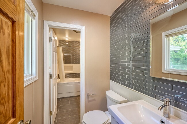 Photo - Spacious 5-Bed Home with Finished Basement & lots of storage space in Chanhassen!