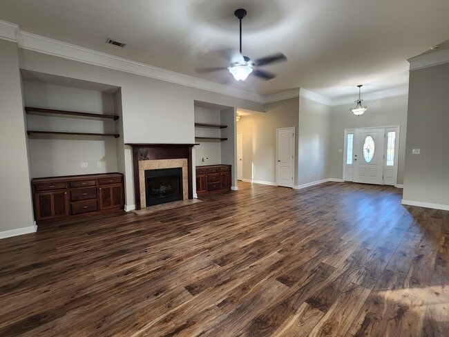 Photo - !!$500!! OFF FIRST MONTH!! Spacious 4BR Home with Fireplace, Screened Porch & Privacy-Fenced Yard