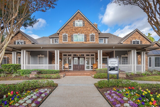 Leasing office entrance - Lodge at Cypresswood Apartments