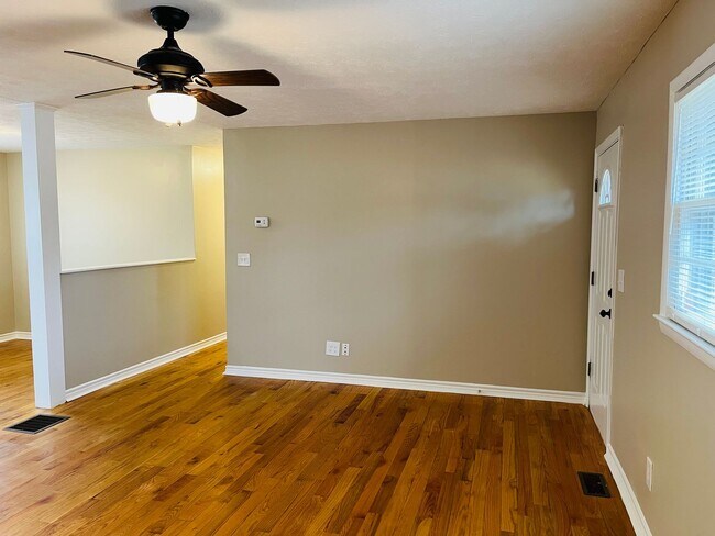 Photo - Charming 3-bedroom, 1.5-bath brick ranch situated on a large private lot in Carrollton! Must see!