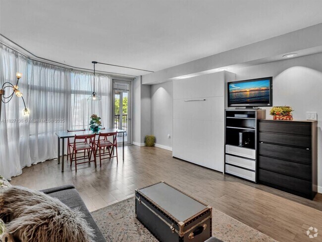Building Photo - 3375 N Country Club Dr Unit 208 Rental
