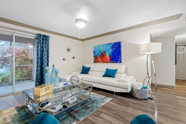 2BR, 2BA - 1,194SF - Living Room - ARIUM Sunrise