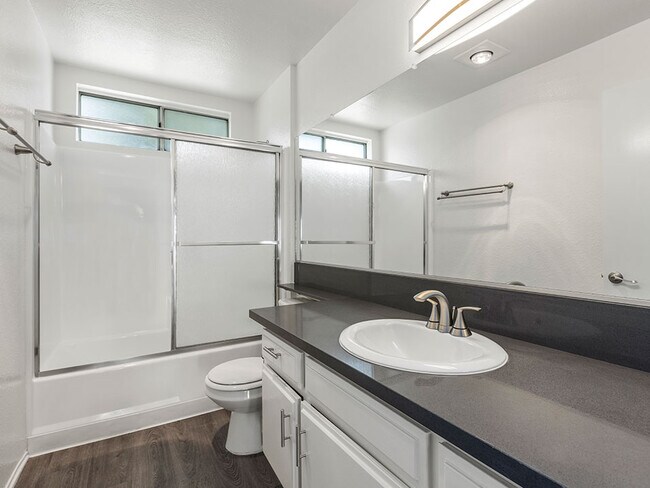 Modern styled bathroom with shower and tub.