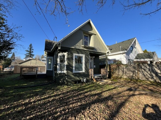 Photo - Updated Portland Home Featuring LVP Flooring, Modern Stainless Appliances, and Soaking Tub