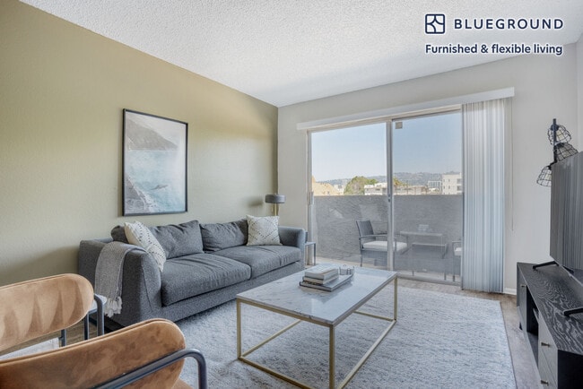 Building Photo - 8560 W Olympic Blvd Rental
