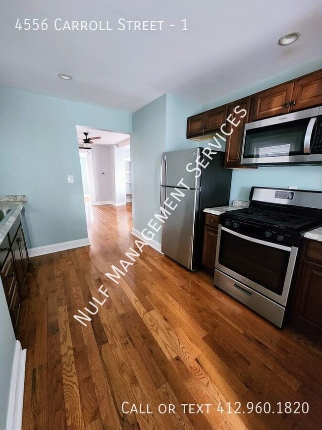 Building Photo - 4556 Carroll St Unit 1