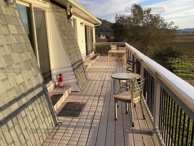 Photo - Upper Carriage house Flat with deck & expansive Vineyard and Sunset views