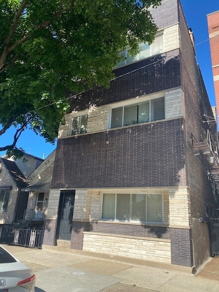 Building Photo - 3145 S May St Unit 1F