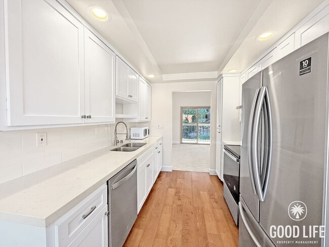 Photo - Top-Floor 3BR Retreat with Balcony Views & In-Unit Laundry in San Diego!