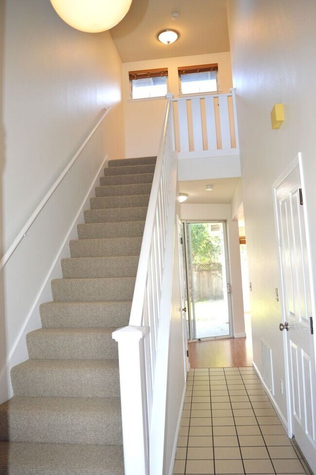 Photo - Spacious Three-Bedroom Two-Story Townhome with Garage and Private Yard