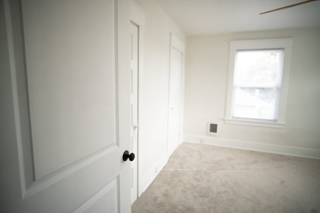 Bedroom with two closets for ample storage - 621 N Lawrence St