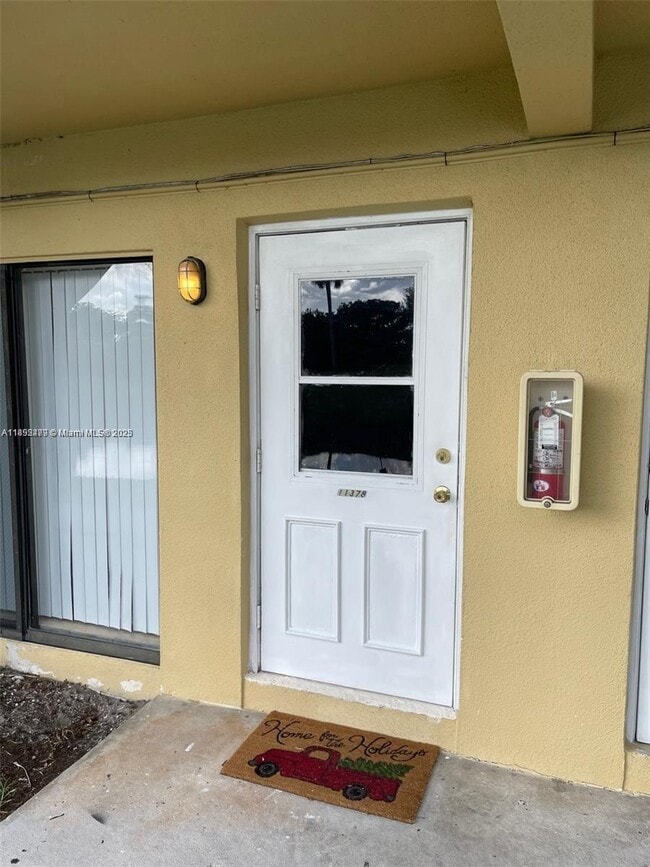 Building Photo - 11378 Royal Palm Blvd Unit 11378