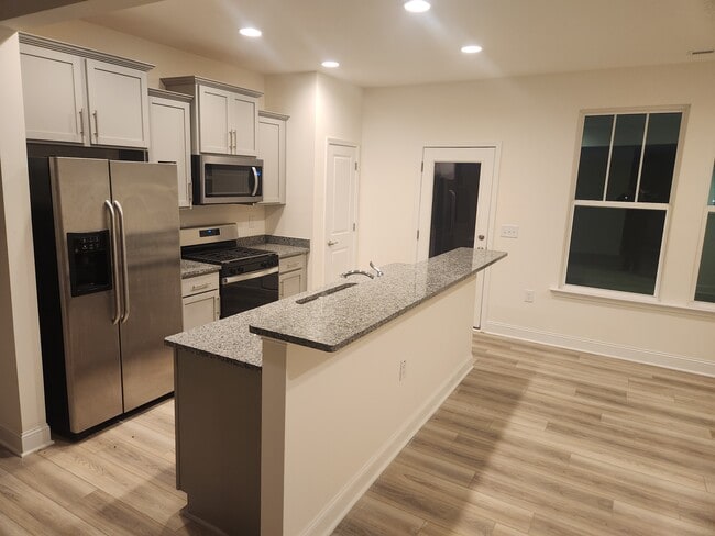 Photo - 105 Hanging Moss Trl Townhome