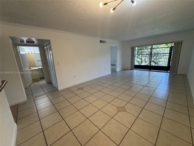 Building Photo - 10315 NW 9th St Cir Unit 105-14 Rental