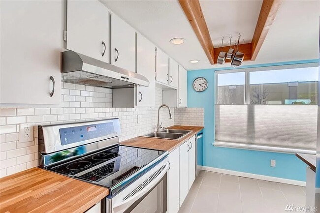 Bright Kitchen with butcher block countertops - 2421 SW Trenton St Unit 209