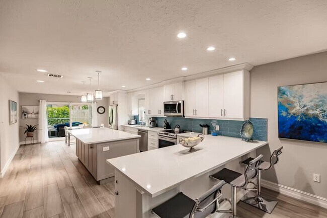 Photo - Updated 3-bedroom, 2-bath single-family home w/ Heated Saltwater Pool