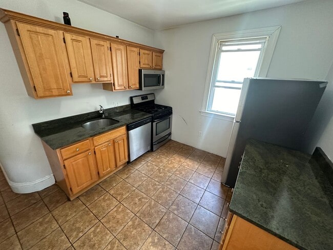 Building Photo - NO FEE - ALLSTON 4 BED/2 BATH - DISHWASHER, LAUNDRY ON SITE, PARKING FOR RENT