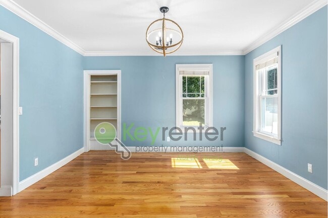 Photo - Spacious 4-Bedroom Home with Fenced Yard &...