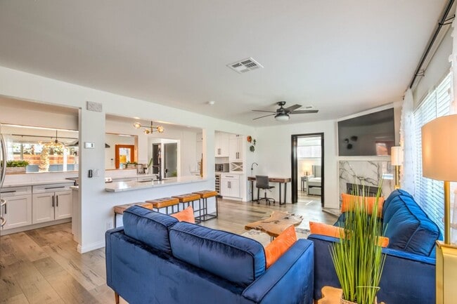 Photo - Vibrant, fully-furnished home near downtown with modern updates, pool & spa with flexible stay op...