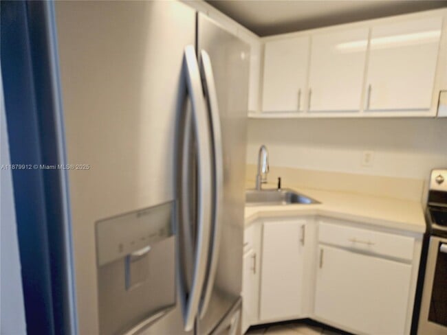 Building Photo - 801 NW 47th Ave Unit 907W Rental