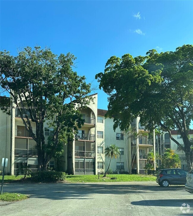 Building Photo - 3300 Spanish Moss Terrace Unit 212 Rental