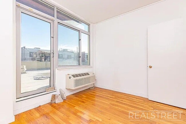 Photo - Massive Outdoor Patio | Spacious 3BR/2BA Apartment in Bushwick–East Williamsburg Unit 2E