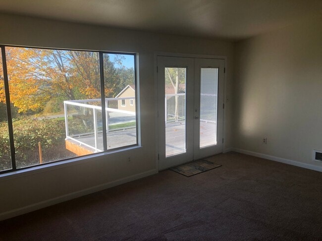 Photo - Charming 2 Bedroom, 2 Bonus Room Home with Beautiful Water view from Porch! Pets Negotiable!